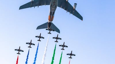 Etihad Airways fly past and aerobatic display by Al Fursan during the UAE national anthem. Victor Besa / The National