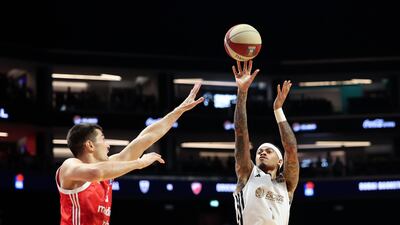 Nate Mason of Dubai Basketball scores at the Coca-Cola Arena in Dubai