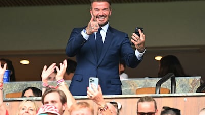 English former football player David Beckham gives a thumbs up during the 2026 World Cup football tournament quarter-final match between Norway and England at Miami Stadium in Miami Gardens. AFP