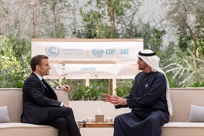 President Sheikh Mohamed with French President Emmanuel Macron during Cop28. UAE Presidential Court