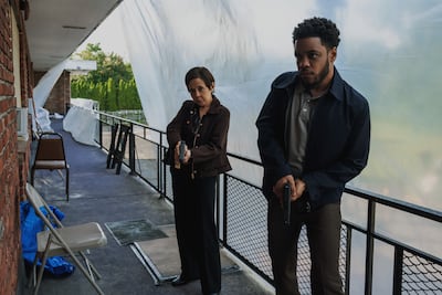Dolly de Leon as Detective Sofia Gonzalez, left, and Jon Michael Hill as Detective Baxter. Photo: Apple TV