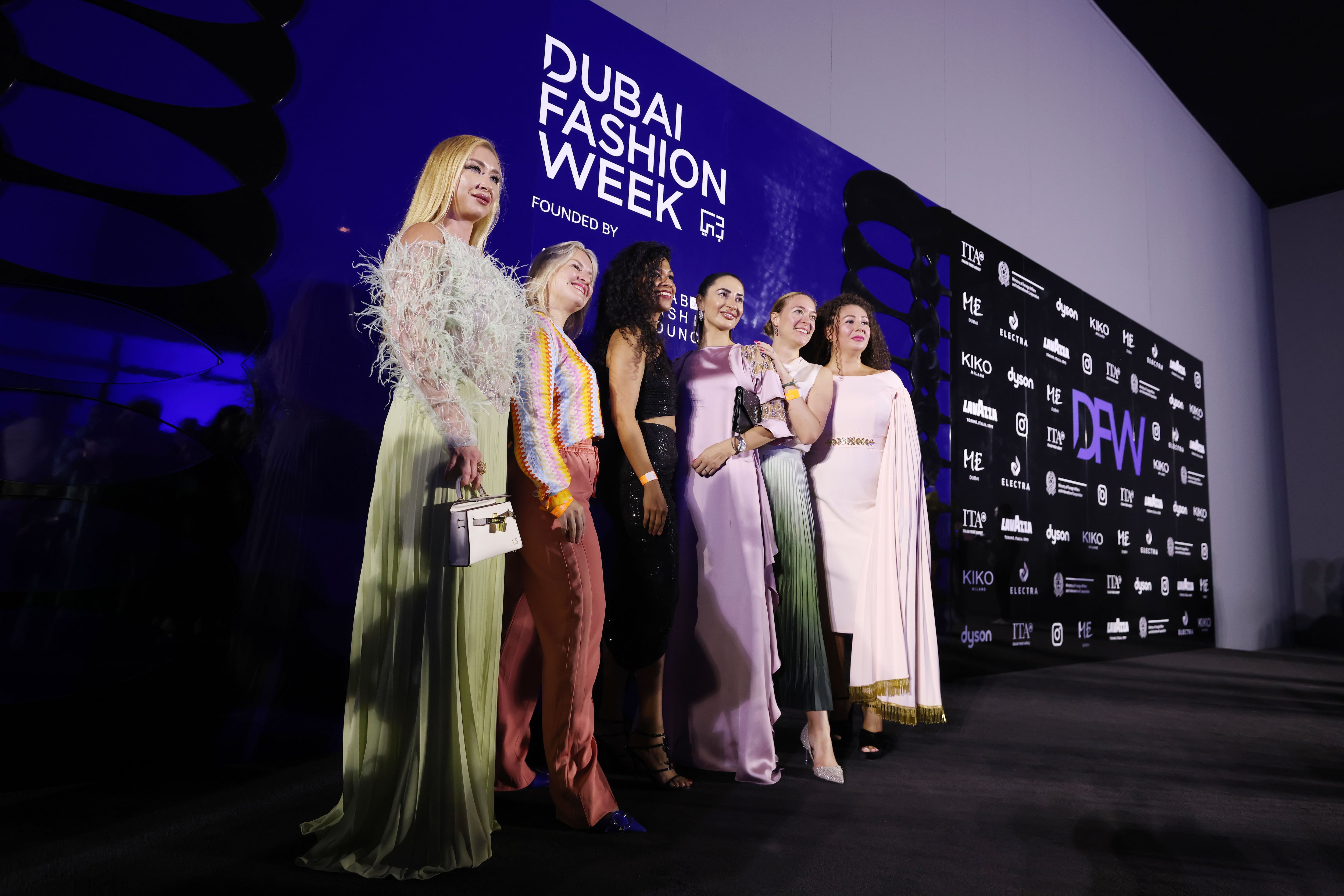 Guests before a presentation at the 2024 Dubai Fashion Week. Chris Whiteoak / The National