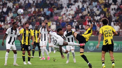Al Jazira's Vinicius Mello attempts a shot at goal.