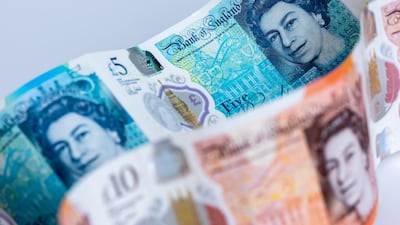 British 10 and five pound banknotes. The pound plunged on Thursday morning. Bloomberg