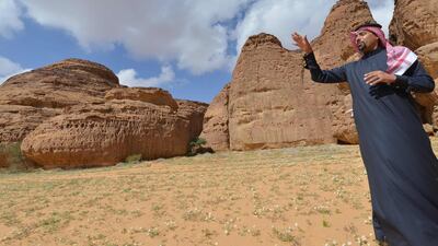 Amr al-Madani, Saudi CEO of the Royal Commission for al-Ula (RCU) speaks to an employee while touring the Sharaan Nature Reserve near the town of al-Ula in northwestern Saudi Arabia. AFP