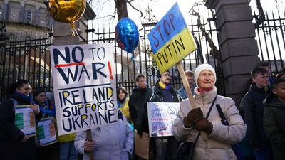 Patsy Sheehan, from Limerick, protests outside Leinster House, Dublin against Vladimir Putin's invasion of Ukraine. PA