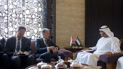 Sheikh Mohammed bin Zayed, Crown Prince of Abu Dhabi and Deputy Supreme Commander of the Armed Forces, confers with British foreign secretary Philip Hammond and Philip Parham, UK ambassador to the UAE, at Al Shattea Palace. Rashed Al Mansoori / Crown Prince Court