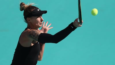Polona Hercog of Slovenia plays a forehand against Aryna Sabalenka of Belarus during their Women's Singles match on Day Two of the Abu Dhabi WTA Women's Tennis Open. Getty Images