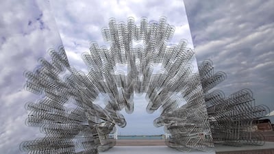 Created with hundreds of bicycles, the work is intended to look blurry, as if it's moving, due to how the bicycles have been positioned. Victor Besa / The National