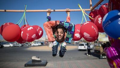 Palestinian boy Mohammed Al Sheikh, 12, shows his skills in Gaza city on April 28, 2016. Mohammed dreams of a Guinness world record for his almost unbelievable body contortions. Mahmud Hams/AFP
