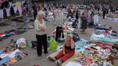 Dan wrote this: People wait for customers at a flea market in Kiev, Ukraine June 25, 2017. Picture taken June 25, 2017. REUTERS/Gleb Garanich