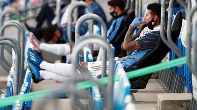 Real Madrid's James Rodriguez in the stands, as play resumed behind closed doors. Reuters