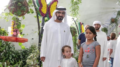 Sheikh Mohammed bin Rashid visits the butterfly garden with his children.