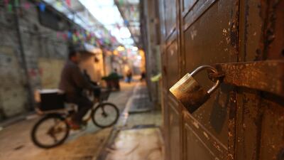 Locked doors in Nablus. Alaa Badarneh / EPA