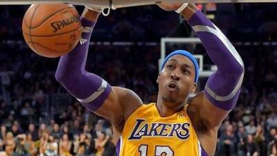 After just one year in Los Angeles, Dwight Howard is leaving and will relocate to Houston. Mark J Terrill / AP Photo