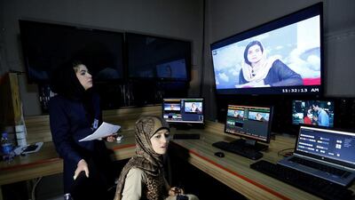 Khatira Ahmadi (R), 20, producer of Zan TV (women’s TV) station, works in the editing room in Kabul, Afghanistan on May 8, 2017. Mohammad Ismail / Reuters