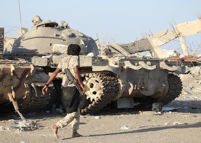 A Yemeni pro-government soldier walks past tanks at a position during a ceasefire in the port city of Hodeidah, Yemen, 04 January 2019. EPA
