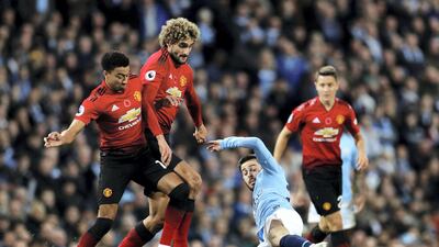 Marouane Fellaini playing for Manchester United against Manchester City in 2018. Reuters