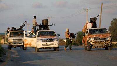 Militias allied to Libya's internationally recognised government fight rival groups in Tripoli in September 2018. Reuters