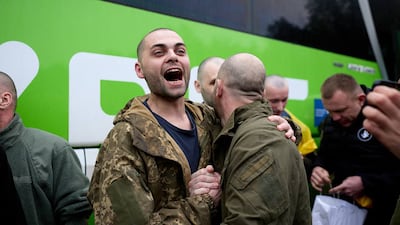 A former Ukrainian prisoner of war shows his delight at being released under a prisoner exchange with Russia, at an undisclosed location. AFP