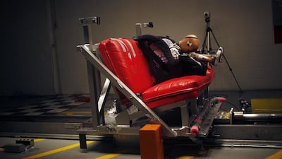 A child seat undergoes a 55kph crash test at a testing facility in the United States. A properly fitted child seat in a car can save a child’s life in the event of a crash, yet many Emirati parents fail to use them. Luke Sharrett / Bloomberg