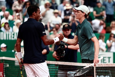 Jannik Sinner, right, shakes hands with Felix Auger-Aliassime following their match at the Monte Carlo ATP Masters. AFP