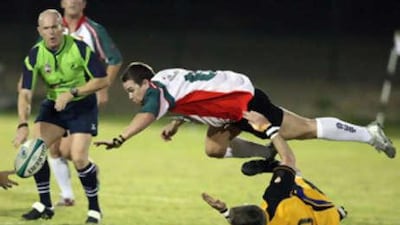 Peter Sampson of the Abu Dhabi Harlequins (then the Bats) dives for the ball during a match against the Dubai Hurricanes at the Palm Sports Resort in Al Ain in April.