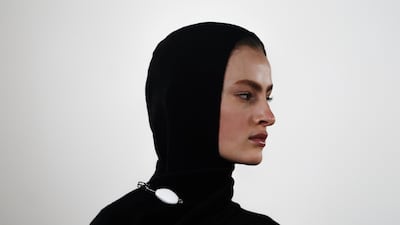 As violinists played, the runway show for Proenza Schouler, staged at the The Brant Foundation, began with sculpted knitwear and combined bold colours. AP