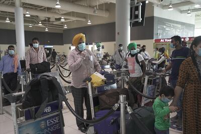 Workers are repatriated to India after losing their jobs across the UAE due to coronavirus. They were helped home by Sikh community groups in Dubai. Courtesy: Guru Nanak Darbar Gurudwara Dubai