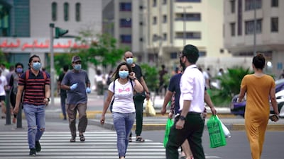 Regulators are urging people to report any quality concerns or adverse incidents involving a face mask brand to authorities. Victor Besa / The National