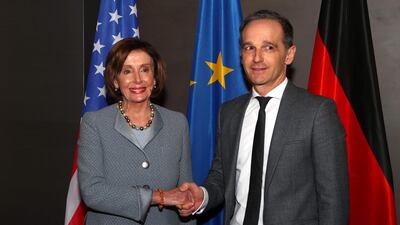 German Foreign Minister Heiko Maas (R) shakes hands with the US' House of Representatives Speaker Nancy Pelosi during a bilateral meeting at the Munich Security Conference in Munich, southern Germany. AFP