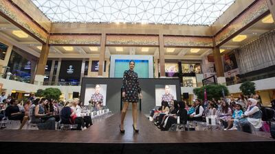 A model walks the runway during the Sonia by Sonia Rykiel autumn/winter 2015 collection show during the opening day of Yas Mall fashion week at Yas Mall. Christopher Pike / The National