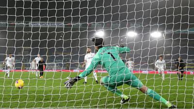 Mateusz Klich scores from the penalty spot past Lukasz Fabianski. Getty
