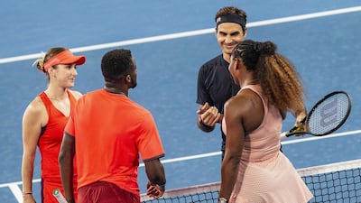 Roger Federer and Belinda Bencic of Switzerland celebrate their win over Frances Tiafoe and Serena Williams of the US. EPA