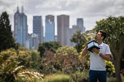 Novak Djokovic with the Norman Brookes Challenge Cup one day after winning the Australian Open in Melbourne. EPA