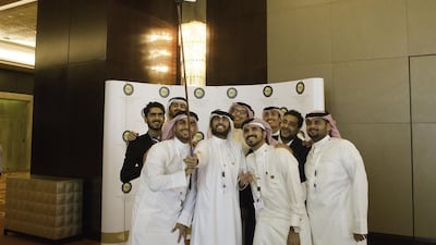 Some of the young people from around the Arabian Gulf region who attended the Health, Sports and the Entertainment in Dubai, organised by the GCC general secretariat, take a group ‘selfie’ at the Conrad Hilton hotel. Jaime Puebla / The National