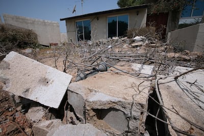 Houses are torn down in Jebel Ali Village as villagers left their homes in 2008. Paulo Vecina/The National