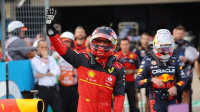 Ferrari's Carlos Sainz celebrates after qualifying in pole position. Reuters