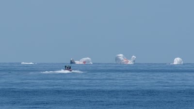 The SpaceX Crew Dragon Endeavour spacecraft is seen as it lands. REUTERS