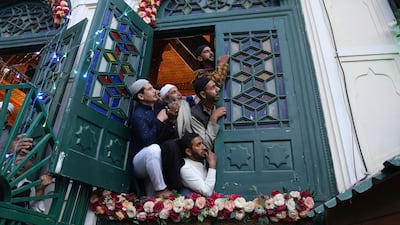 Muslims crowd to see a relic of Sheikh Syed Abdul Qadir Jilani being displayed at his shrine in Srinagar, Indian Kashmir, on the anniversary of the Sufi saint's death. EPA