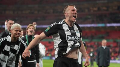 Newcastle's Dan Burn celebrates after the match at Wembley Stadium. Getty Images