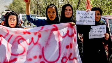 Roqia Saee, second left, an Afghan refugee living in Germany, says the Taliban's access to Afghanistan’s diplomatic missions in Europe puts Afghans in danger. AFP
