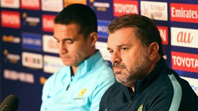 Australia's Tim Cahill, left, and manager Ange Postecoglou during a press conference at the Rialto in Melbourne, Victoria, Australia/ Julian Smith / EPA