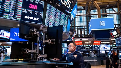 Traders work on the floor of the New York Stock Exchange. The S&P 500 sank 1.5 per cent on Friday, with banks and chip makers leading losses. AP