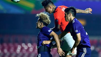 Chile's Erick Pulgar heads in the opening goal against Japan. Chile won the Group C 2019 Copa America match at Morumbi Stadium in Sao Paulo 4-0. AFP