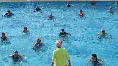 Swimmers take part in an aqua aerobics class in Hampton Lido in London. Reuters