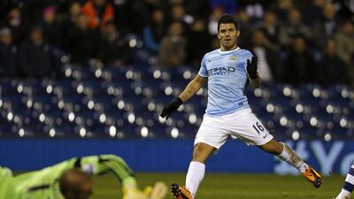 Sergio Aguero scored once before coming off in Manchester City's victory on Wednesday night. Adrian Dennis / AFP