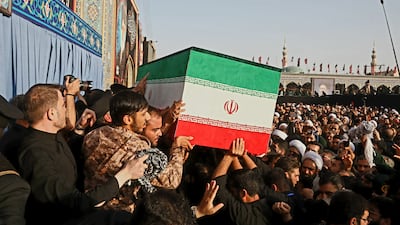 Iranians lift the coffin of Ayatollah Ali Khamenei during a funeral event in Qom. EPA