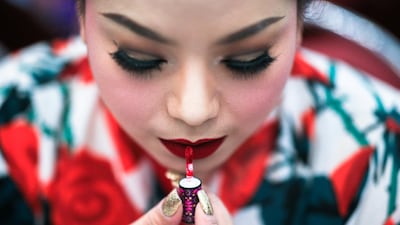 A participant prepares backstage before the final show of the Miss Jumbo 2018 at a department store in Nakhon Ratchasima, Thailand. Athit Perawongmetha / Reuters
