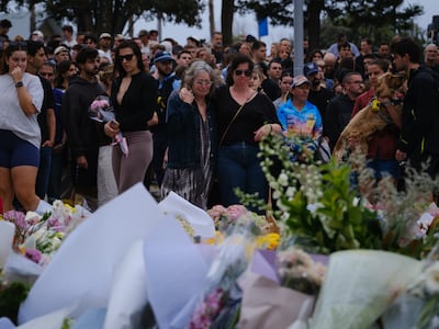 Mourners lay flowers at Bondi Pavilion a day after the shooting in Sydney. Getty Images